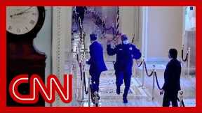 Jake Tapper reacts to video of officer rushing Mitt Romney to safety