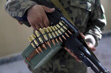 ADDS MILITIAMEN INSTEAD OF PEOPLE'S - Militiamen loyal to Ata Mohammad Noor, chief of Jamiat-e-Islami and a powerful northern…