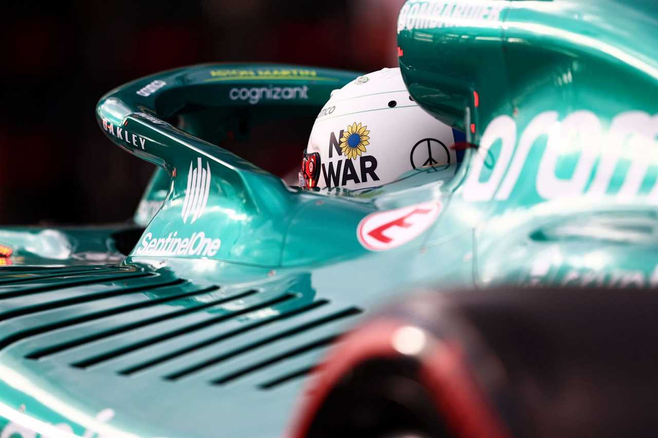 Aston Martin's Sebastian Vettel sits in his car in the Pitlane during qualifying ahead of the F1 Grand Prix of Australia (Photo by Mark Thompson/Getty Images)