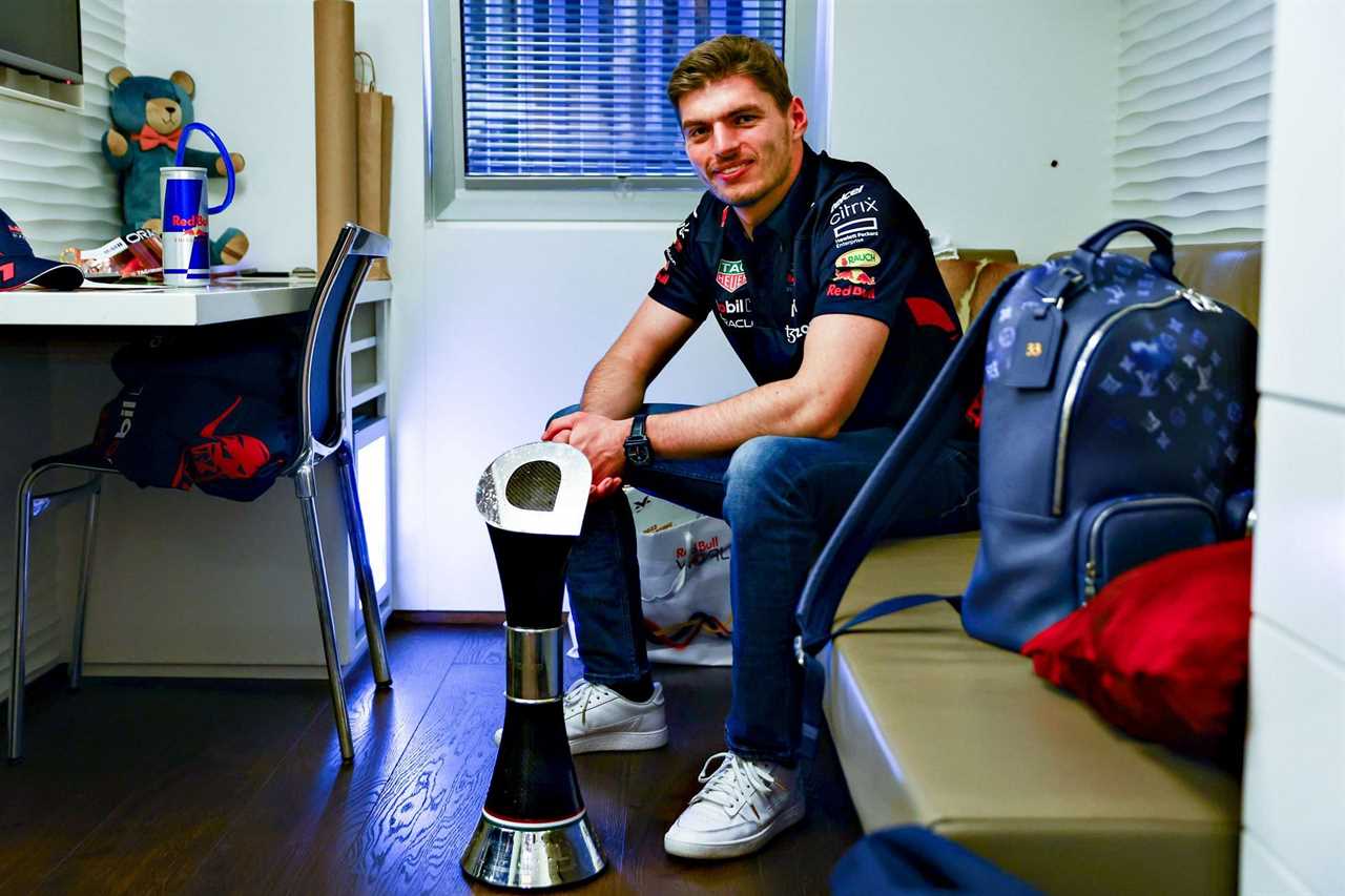 Red Bull driver Max Verstappen poses for a photo after winning the 2022 F1 Hungarian GP (Photo by Mark Thompson/Getty Images)