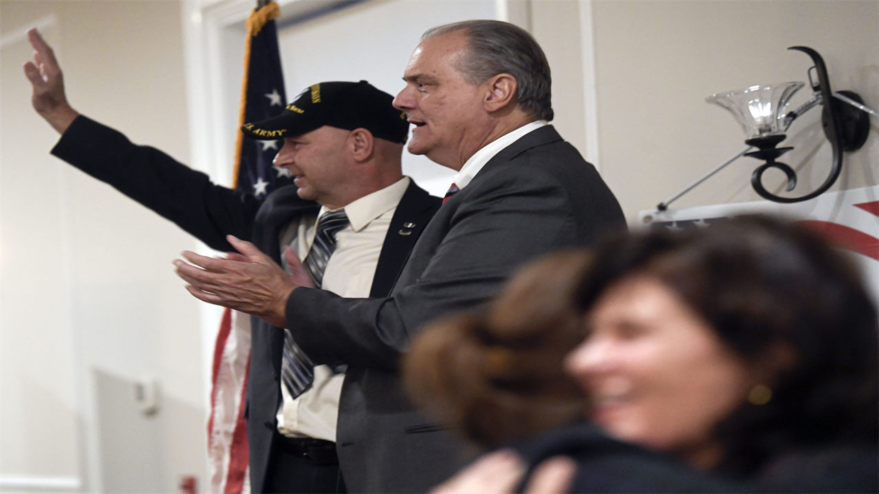 Clay Breece, right, chairman of the Berks County Republican Committee, with Republican gubernatorial candidate Doug Mastriano Oct. 18 at the Berks County Republican fall dinner in Stokesay Castle. (BILL UHRICH - READING EAGLE)