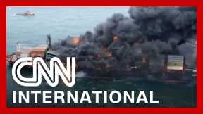 Burning ship may cause disastrous oil spill
