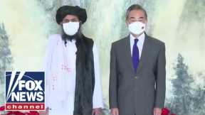 China and Taliban officials meet as US exits Afghanistan