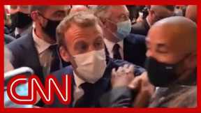 French President Macron hit with egg during event