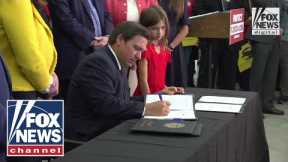 Florida's Ron DeSantis signs bill limiting COVID mandates