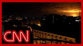 Sky glows after massive explosions near Kyiv