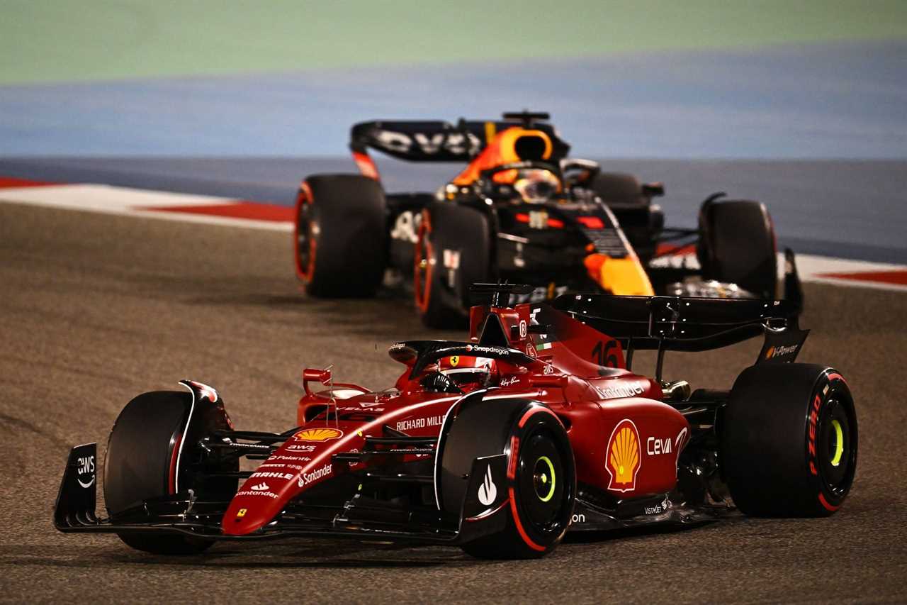 Ferrari's Charles Leclerc (foreground) tussles with Red Bull's Max Verstappen (background) during the 2022 F1 Bahrain GP (Photo by Clive Mason/Getty Images)