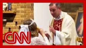 Watch priest's reaction when 7-year-old chugs first communion wine