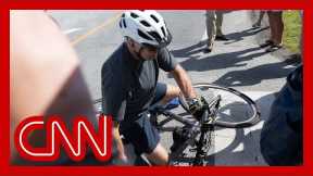 Biden falls while riding his bike