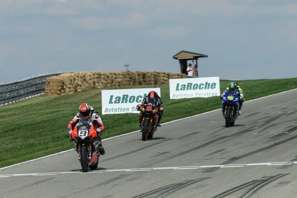 Danilo Petrucci (9) takes second place ahead of Mathew Scholtz (11) and Cameron Petersen (45) in MotoAmerica Superbike Race One. Photo by Brian J. Nelson, courtesy MotoAmerica.
