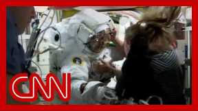 NASA halts spacewalks after water leaked into astronaut's helmet