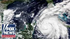 Ian downgrades to tropical storm as millions are without power