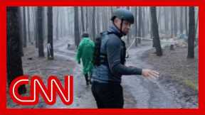 CNN reporter visits mass burial site after Russian soldiers retreat