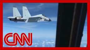 Video shows Chinese fighter jet intercepting US aircraft