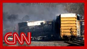 New surveillance video shows train wheel overheating before crash