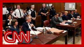 'Bit of a scowl in his face': CNN reporter describes mood in court