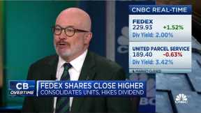 FedEx shares close higher after hiking dividend and consolidating units