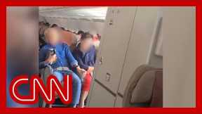Passenger opens plane emergency exit midair
