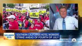 Southern California hotel workers, Canadian West Coast port workers begin strike