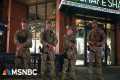 National Guard troops now carrying