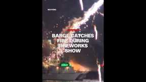 Japanese firework festival ends with barges on fire