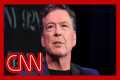 Trial date set after Comey enters not 