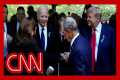See Harris and Trump shake hands at