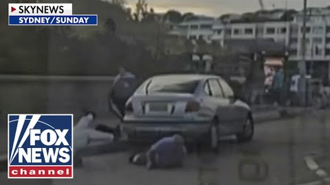 JARRING footage shows civilians trying to disarm Australia terror suspects