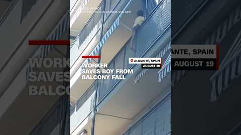 Worker saves boy from balcony fall