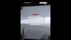 Waterspout triplets form off Spanish harbor