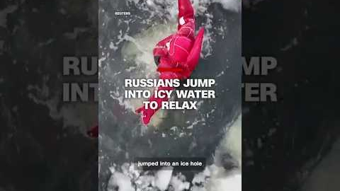 Russians jump into icy water to relax