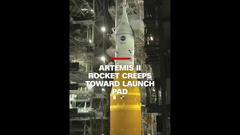 Artemis II rocket creeps toward launch pad